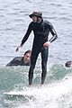 adam brody goes surfing in his wetsuit 31