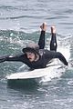adam brody goes surfing in his wetsuit 32