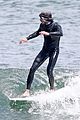 adam brody goes surfing in his wetsuit 36