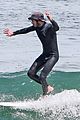 adam brody goes surfing in his wetsuit 38
