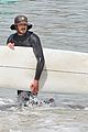adam brody goes surfing in his wetsuit 39