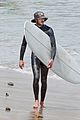 adam brody goes surfing in his wetsuit 40