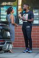 lamorne morris chatting with a friend 03