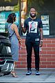 lamorne morris chatting with a friend 05