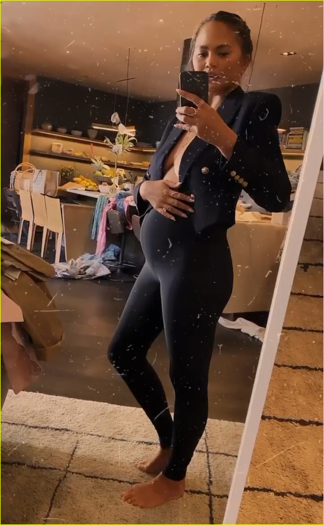 Chrissy Teigen Puts Baby Bump on Full Display in New Video Watch