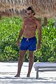 aaron diaz shirtless at the beach in cancun 05