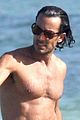 aaron diaz shirtless at the beach in cancun 06