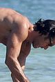 aaron diaz shirtless at the beach in cancun 08