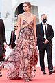 taylor hill matches mask to dress venice film festival 15