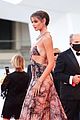 taylor hill matches mask to dress venice film festival 21