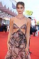 taylor hill matches mask to dress venice film festival 23
