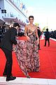 taylor hill matches mask to dress venice film festival 43