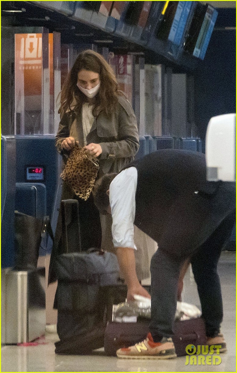 Lily James & Dominic West Cuddle at Airport After PDA Pics (Photos