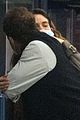 lily james dominic west hug airport 04