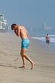 joe montana shirtless at the beach with his kids 04