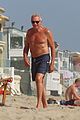 joe montana shirtless at the beach with his kids 09