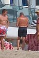 joe montana shirtless at the beach with his kids 30
