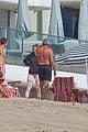 joe montana shirtless at the beach with his kids 34