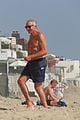 joe montana shirtless at the beach with his kids 42