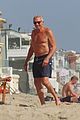 joe montana shirtless at the beach with his kids 44