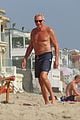 joe montana shirtless at the beach with his kids 45