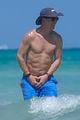peyton manning shirtless at the beach 03