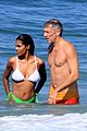 vincent cassel tina kunakey bare their hot bodies at the beach 03