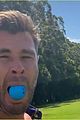 chris hemsworth jokes around while golfing with his son brother liam 05