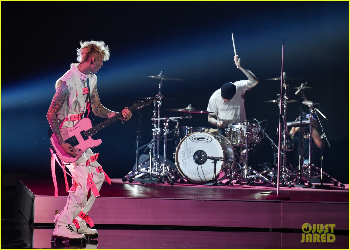 Megan Fox Introduces Machine Gun Kelly's Performance at American Music