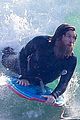 sam worthington shaggy beard surfing lara worthington 02