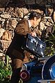 harry styles looks dapper in two suits on dont worry darling set in palm springs 13