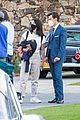 harry styles looks dapper in two suits on dont worry darling set in palm springs 35