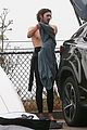 adam brody strips out of wetsuit surfing leighton meester 03