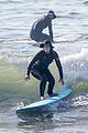 adam brody strips out of wetsuit surfing leighton meester 25