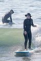 adam brody strips out of wetsuit surfing leighton meester 26
