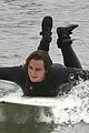 adam brody strips out of wetsuit surfing leighton meester 45