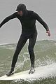 adam brody strips out of wetsuit surfing leighton meester 55