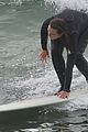 adam brody strips out of wetsuit surfing leighton meester 73