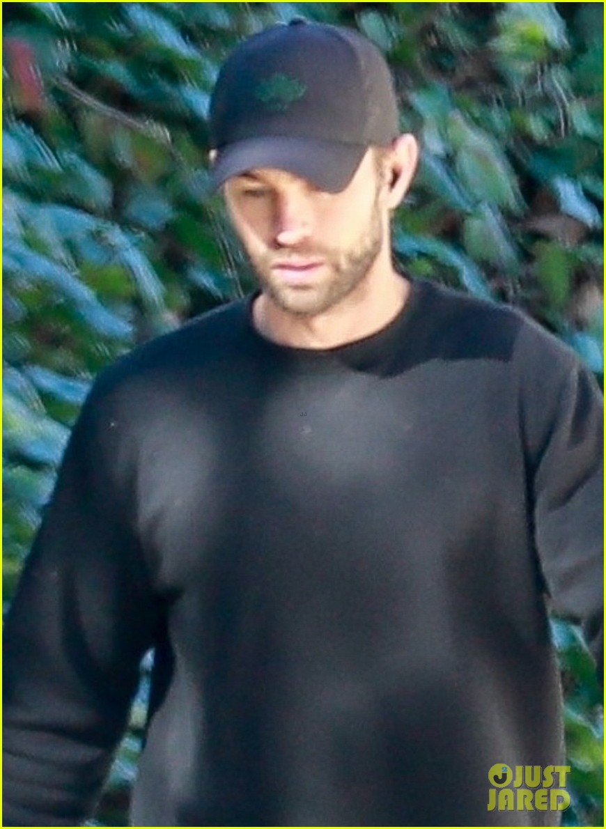 chace crawford wears all black while walking his dog 06