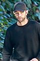 chace crawford wears all black while walking his dog 02