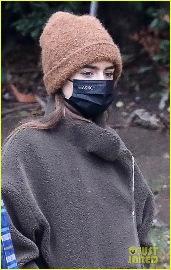 lily collins charlie mcdowell mask up walking dog 024519610