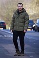 sam smith all smiles while walking with a friend london 03