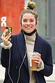 annie murphy all smiles taking video call in nyc 02