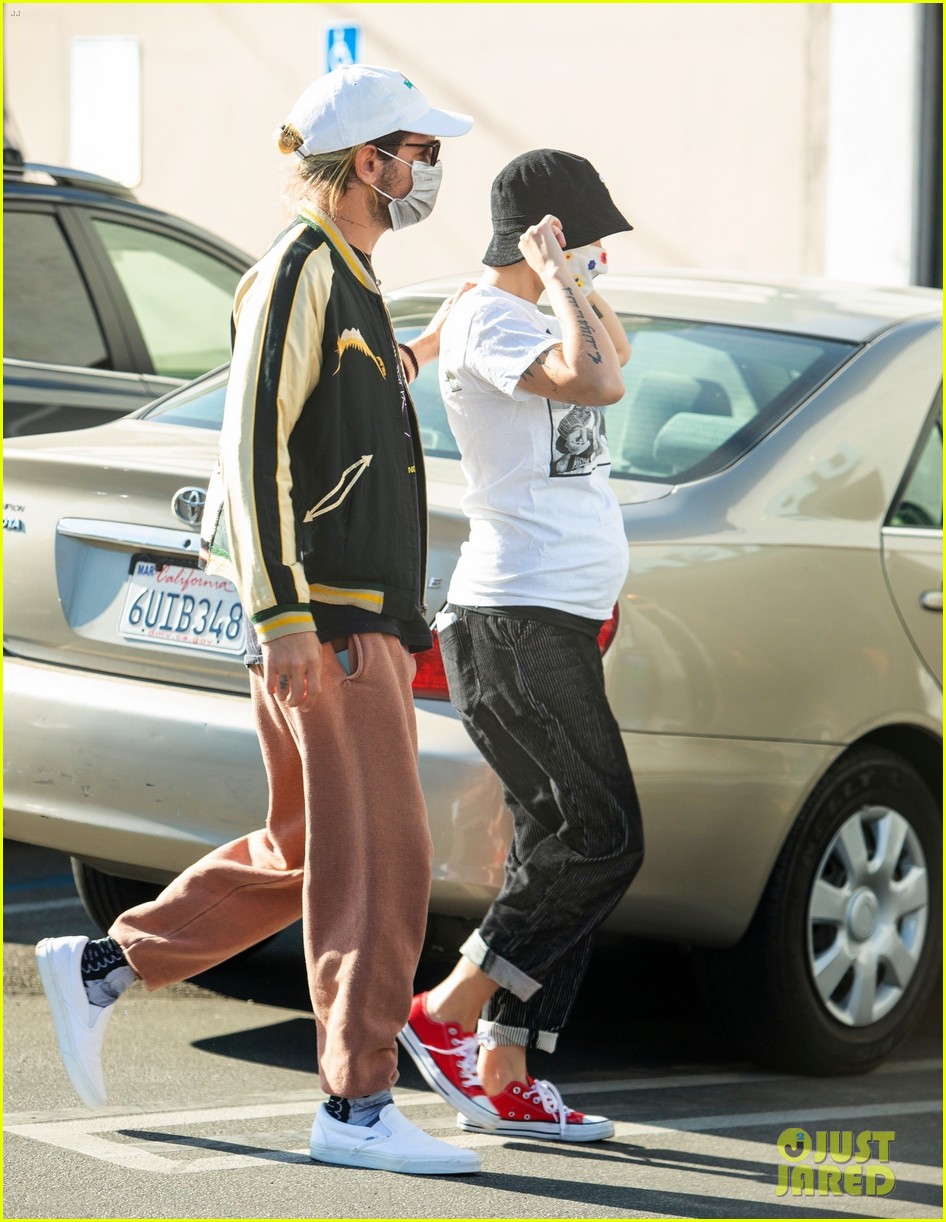 Halsey Covers Baby Bump in White T-Shirt While Out with Boyfriend Alev