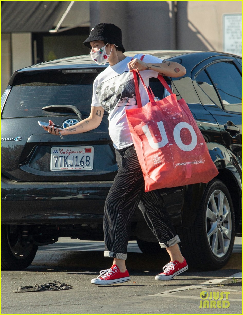 Halsey Covers Baby Bump in White T-Shirt While Out with Boyfriend Alev