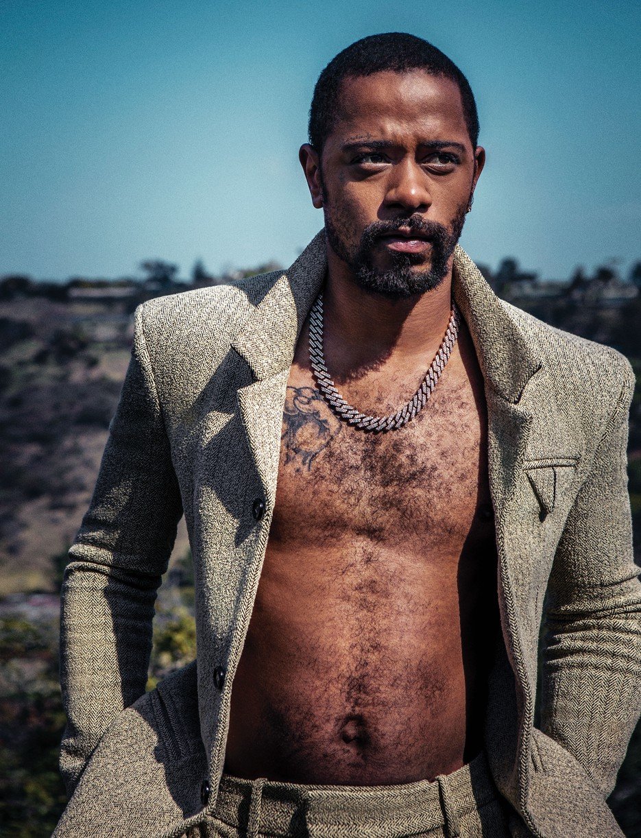 Lakeith Stanfield goes shirtless under his tweed jacket in this shot from h...