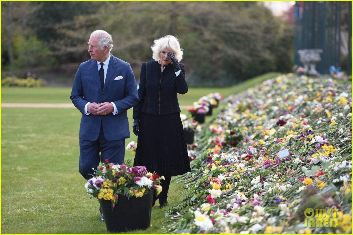 Prince Charles & Duchess Camilla View Tributes to Prince Philip Left By