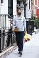 katie holmes picks up flowers during a casual solo outing 10