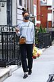 katie holmes picks up flowers during a casual solo outing 12