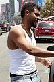 usher shows off his muscles tank shirt shopping in weho 04